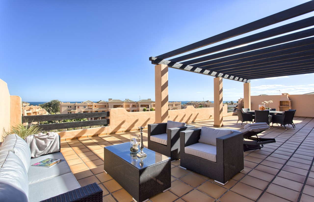 Beachside penthouse for sale in Casares Beach with large terrace and sea view