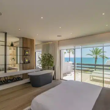 Stunning frontline beach townhouse with sea views on the Marbella Golden Mile Picture 1