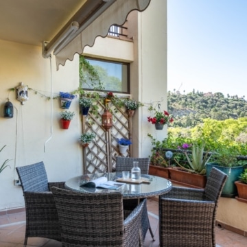 Elegant 2-bedroom apartment with charming interiors within the highly sought-after Los Arqueros Golf & Country Club, Benahavis Picture 0