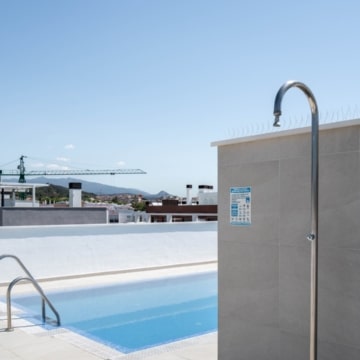 Brand new apartment with rooftop pool and stunning views in Estepona Picture 31