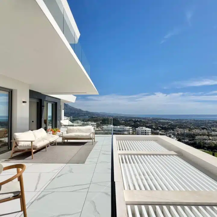 Luxury corner apartment with panoramic sea and golf views in BYU Hills, Benahavis Picture
