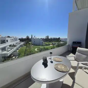 Bright Top-Floor 4-Bedroom Apartment with Sea Views and an Exceptional L-Shaped Terrace in Acqua Gardens Estepona Picture 0