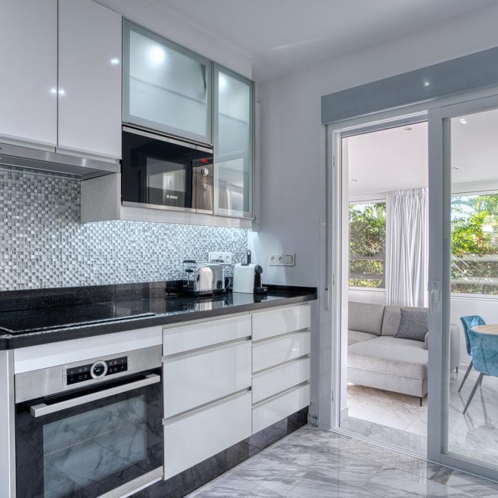 Fully renovated two bedroom, ground floor apartment in the well-known and gated community Marbella Real Picture 16