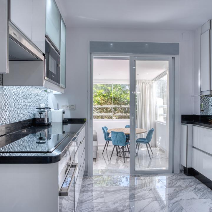 Fully renovated two bedroom, ground floor apartment in the well-known and gated community Marbella Real Picture 31