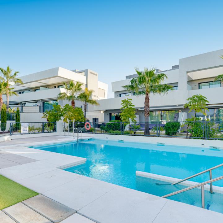 Exceptional four-bedroom townhouse located in an exclusive gated community in La Cala De Mijas Picture