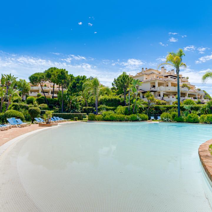 Spectacular two-bedroom, elevated ground-floor apartment in the prestigious gated community of Capanes del Golf, Benahavis Picture